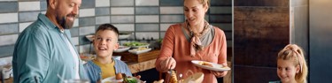 Family At Breakfast Buffet