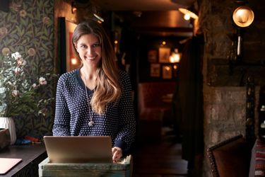 Woman at registration computer