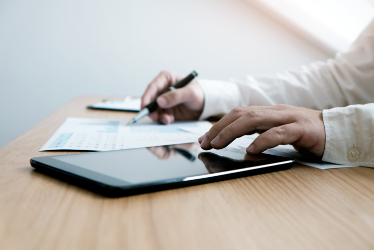 person looking at a statement of purpose document