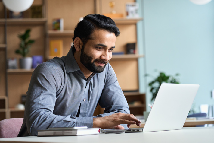 man looking on the laptop