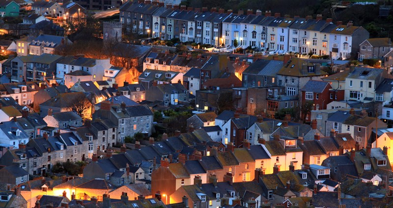 Image of a city at night related to temporary accommodation