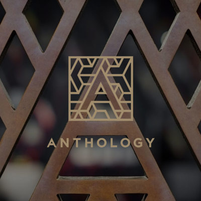 Geometric letter A logo with the word ‘Anthology’ below, set against a patterned background