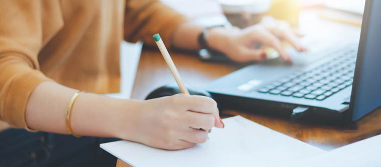 person studying on a laptop