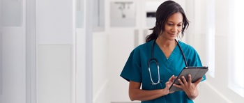 A nurse using electronic health records.