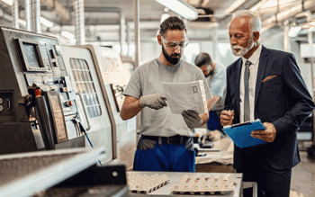 Men using manufacturing software