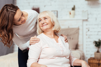 Care worker with elderly lady after a fall