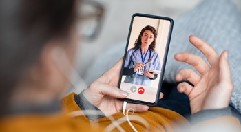 A virtual ward call between patient and nurse.