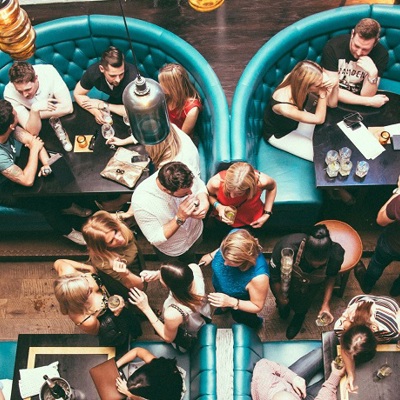 A room full of people at a restaurant 