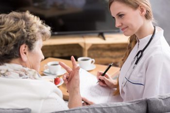 Nurse discussing what is the care cap