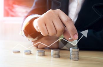 Man looking at how to improve cash flow