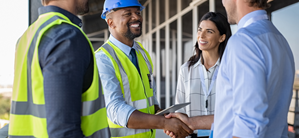 Group of construction professionals asking vendors questions about their Construction ERP Software