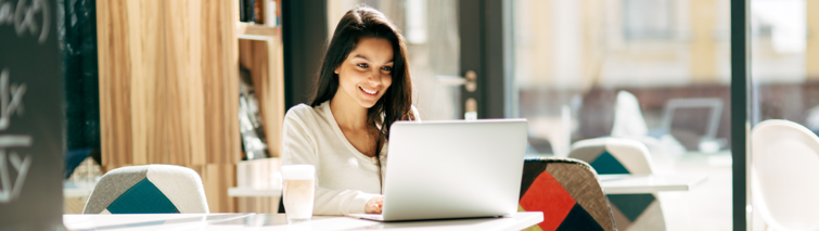 lady smiling at laptop