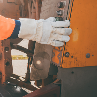 Waste collector operating garbage truck