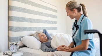 A nurse visiting a virtual ward patient due to a health episode.