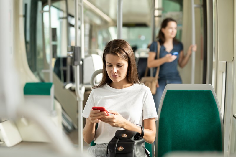 an image of a girl on a public bus to represent home-to-school transport 