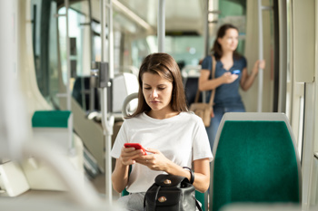 an image of a girl on a public bus to represent home-to-school transport