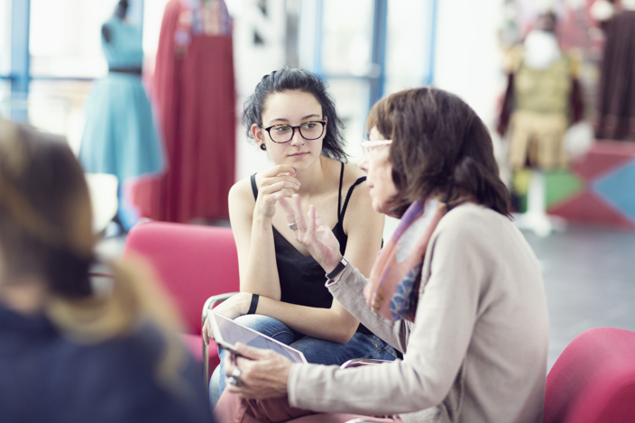 two women discussing social prescribing referral