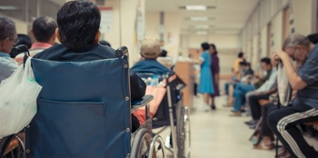 A busy hospital waiting room. Virtual wards benefit hospitals by reducing overcrowding.