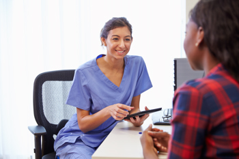 Doctor talking to patient