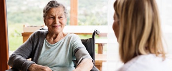 A female patient engaging with a doctor.