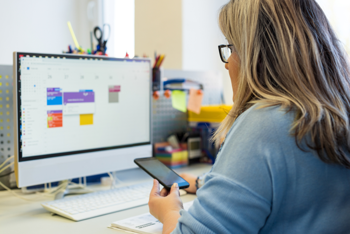 Women looking at cleaning company software