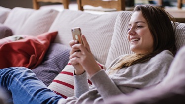 A young woman in an online social group as per social prescribing.
