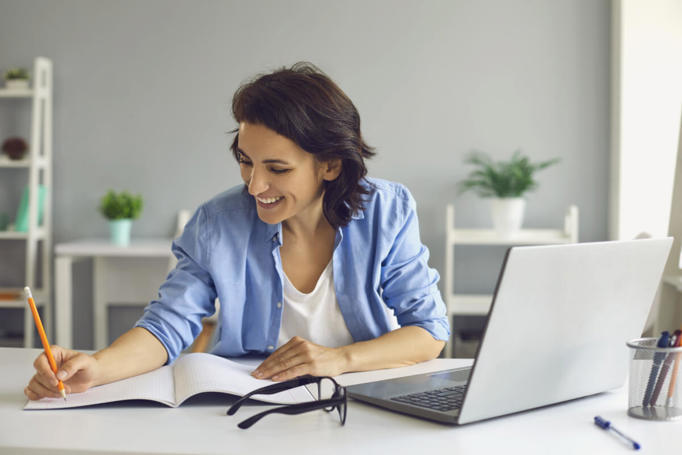 woman using a learning management system