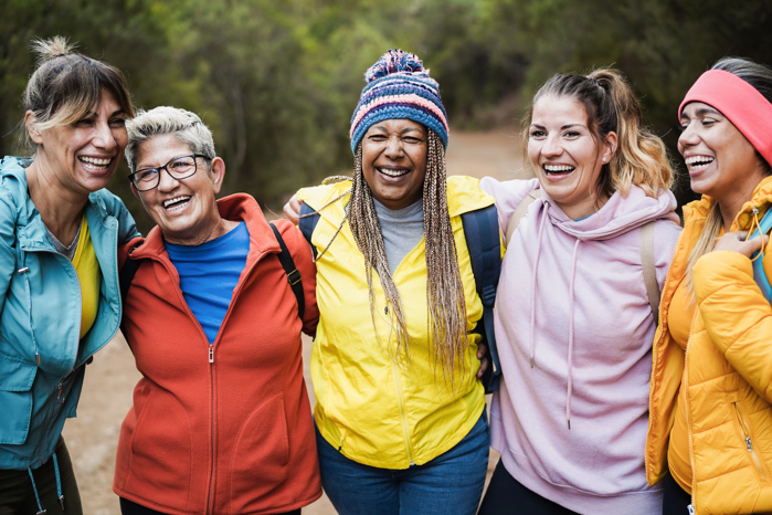 a group of women hugging